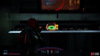 Defeat the Cerberus grunts and use the first computer console  to gain some Prothean data.
